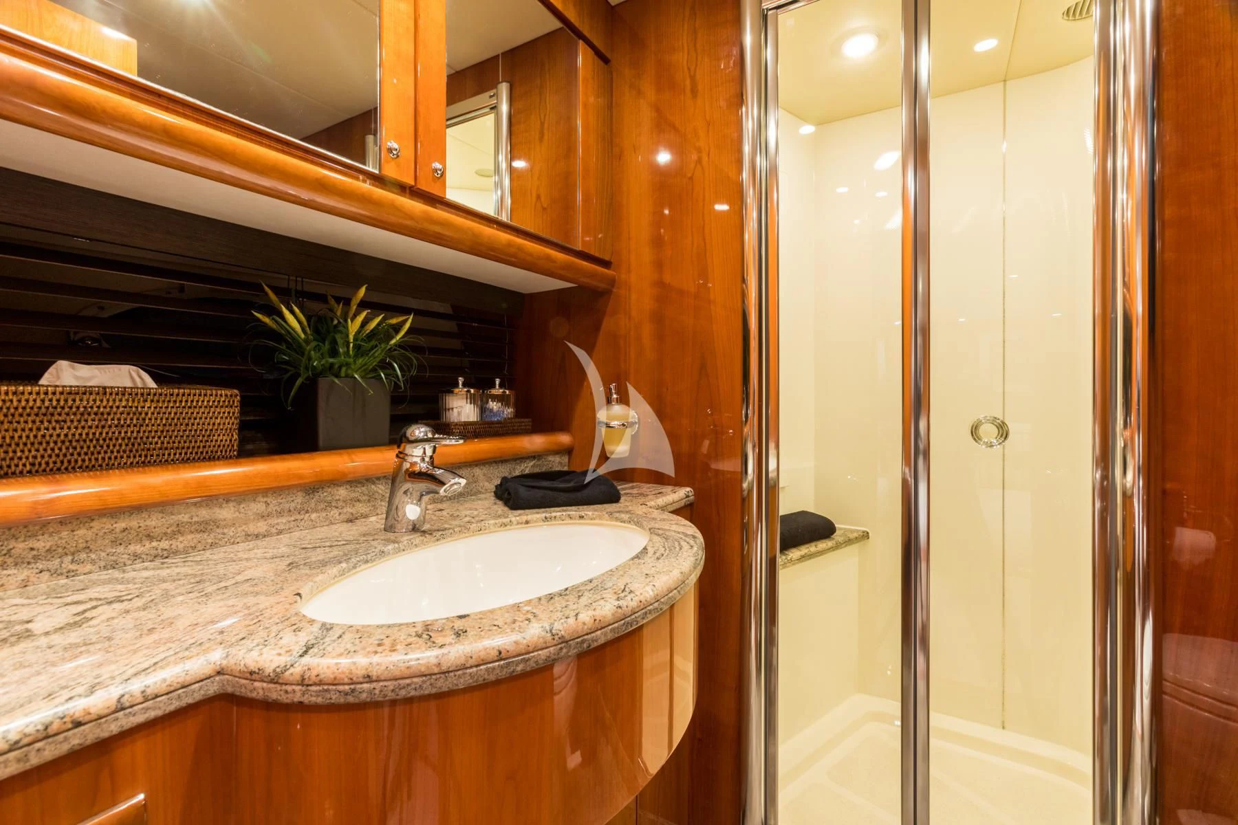 a bathroom with a sink and a shower aboard WINNING STREAK 2 Yacht for Sale