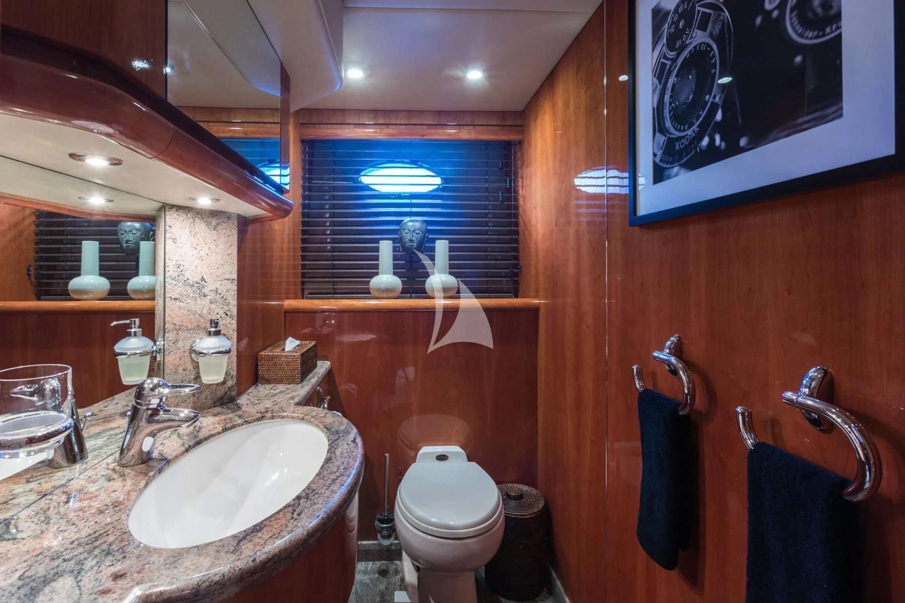 a bathroom with a sink and toilet aboard WINNING STREAK 2 Yacht for Sale