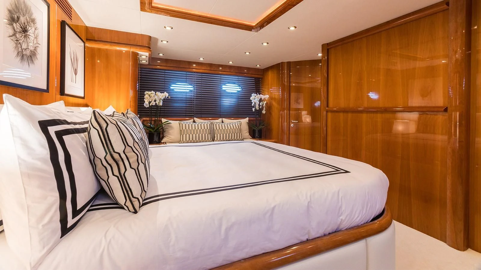 a bed with white sheets aboard WINNING STREAK 2 Yacht for Sale