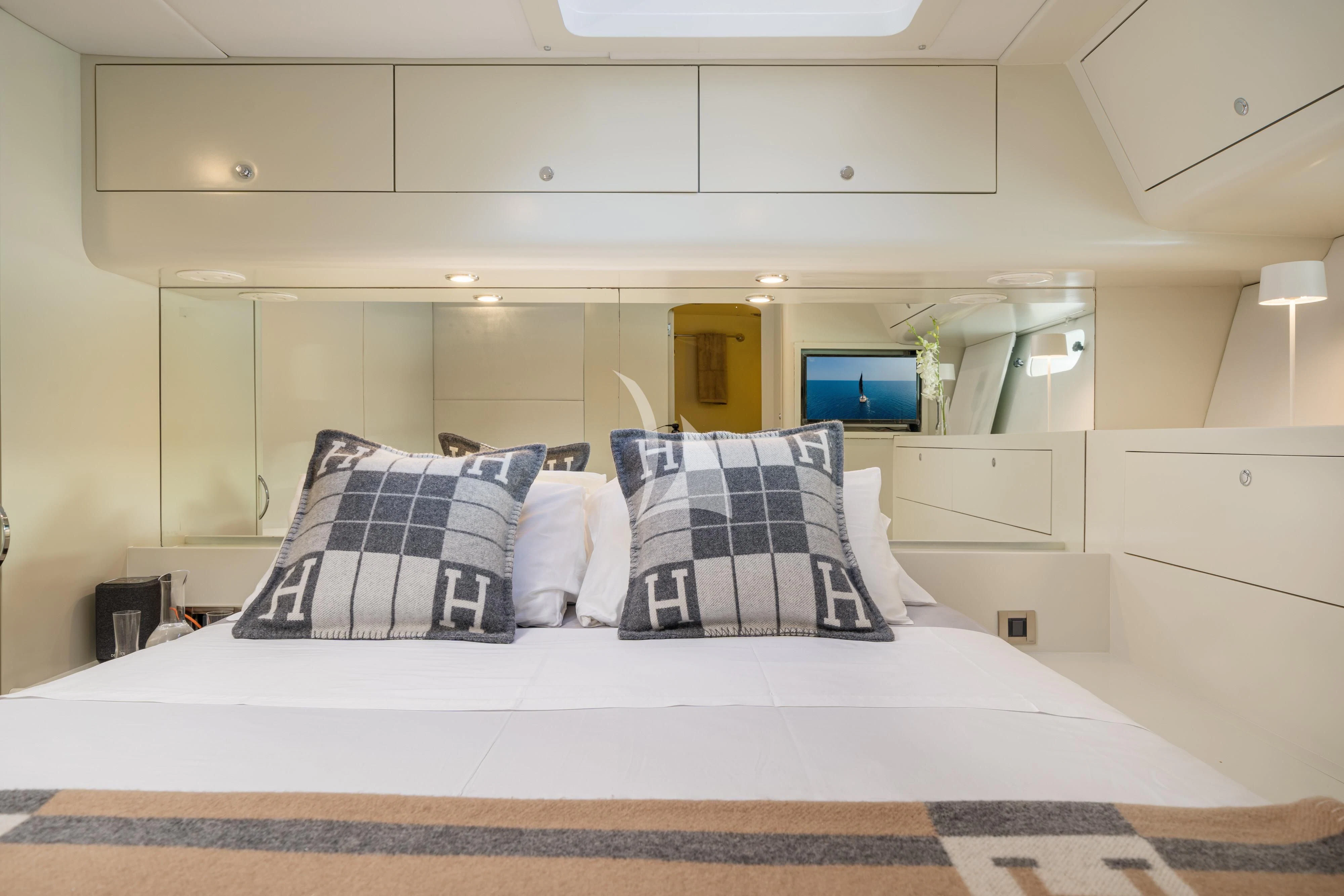 a bed with white sheets aboard ASHLEYROSE Yacht for Sale