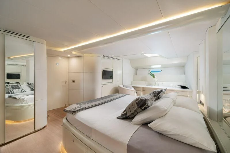 a bedroom with a bed aboard ASHLEYROSE Yacht for Sale
