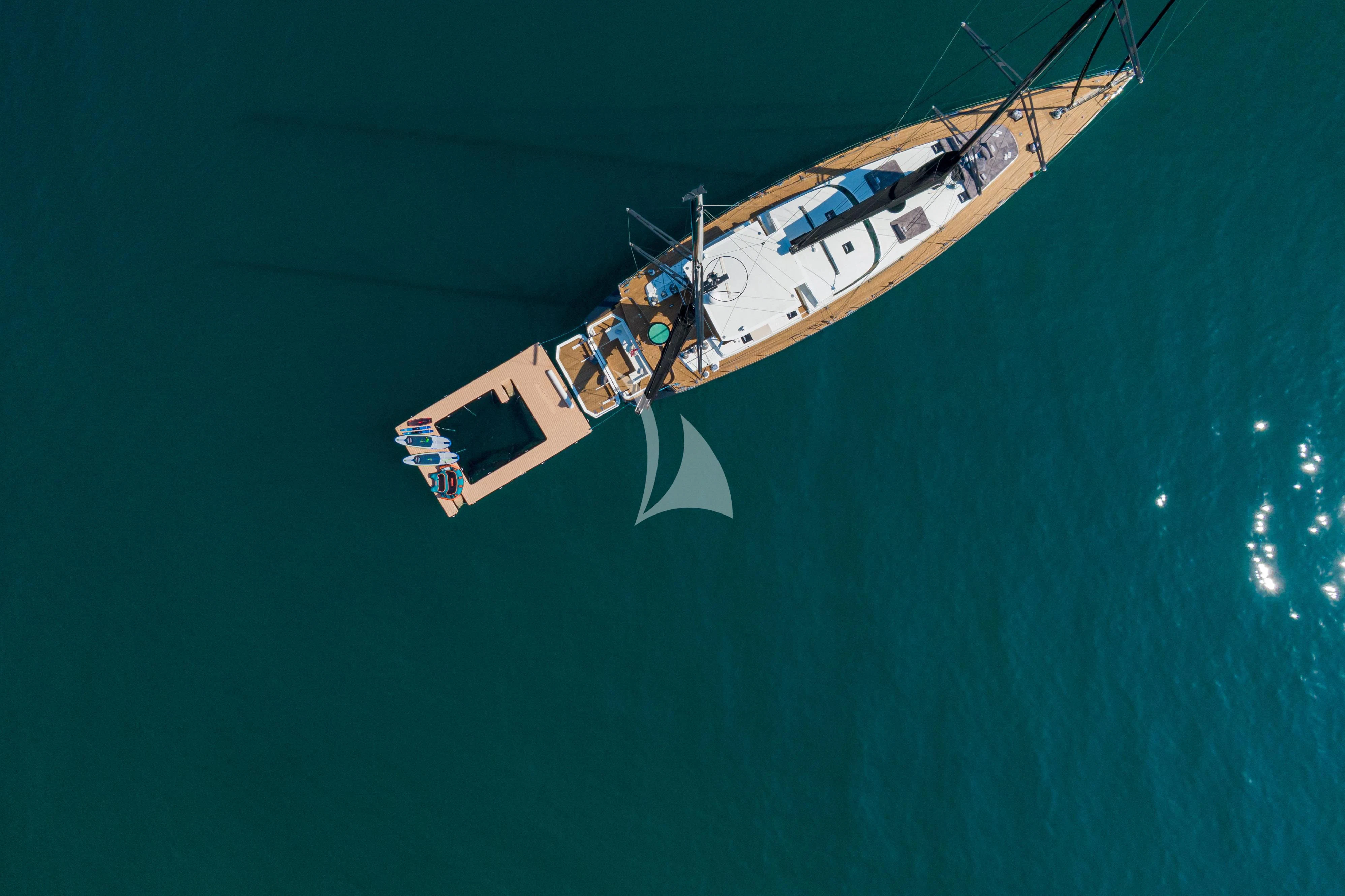 a plane flying in the sky aboard ASHLEYROSE Yacht for Sale