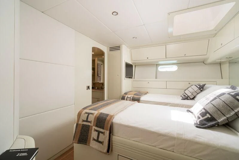 a room with two beds aboard ASHLEYROSE Yacht for Sale