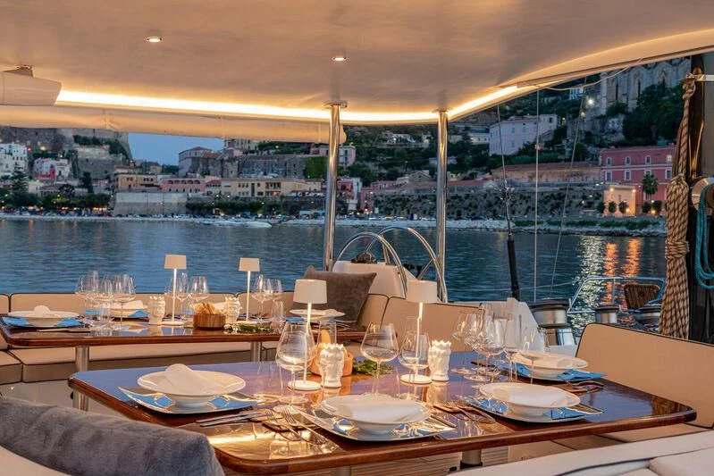 a table set for a dinner aboard ASHLEYROSE Yacht for Sale
