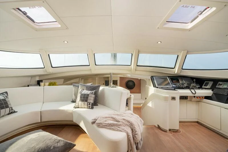 a room with a couch and a desk aboard ASHLEYROSE Yacht for Sale