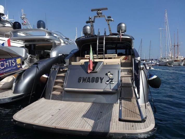 a boat on a dock aboard SWAGGY Yacht for Sale