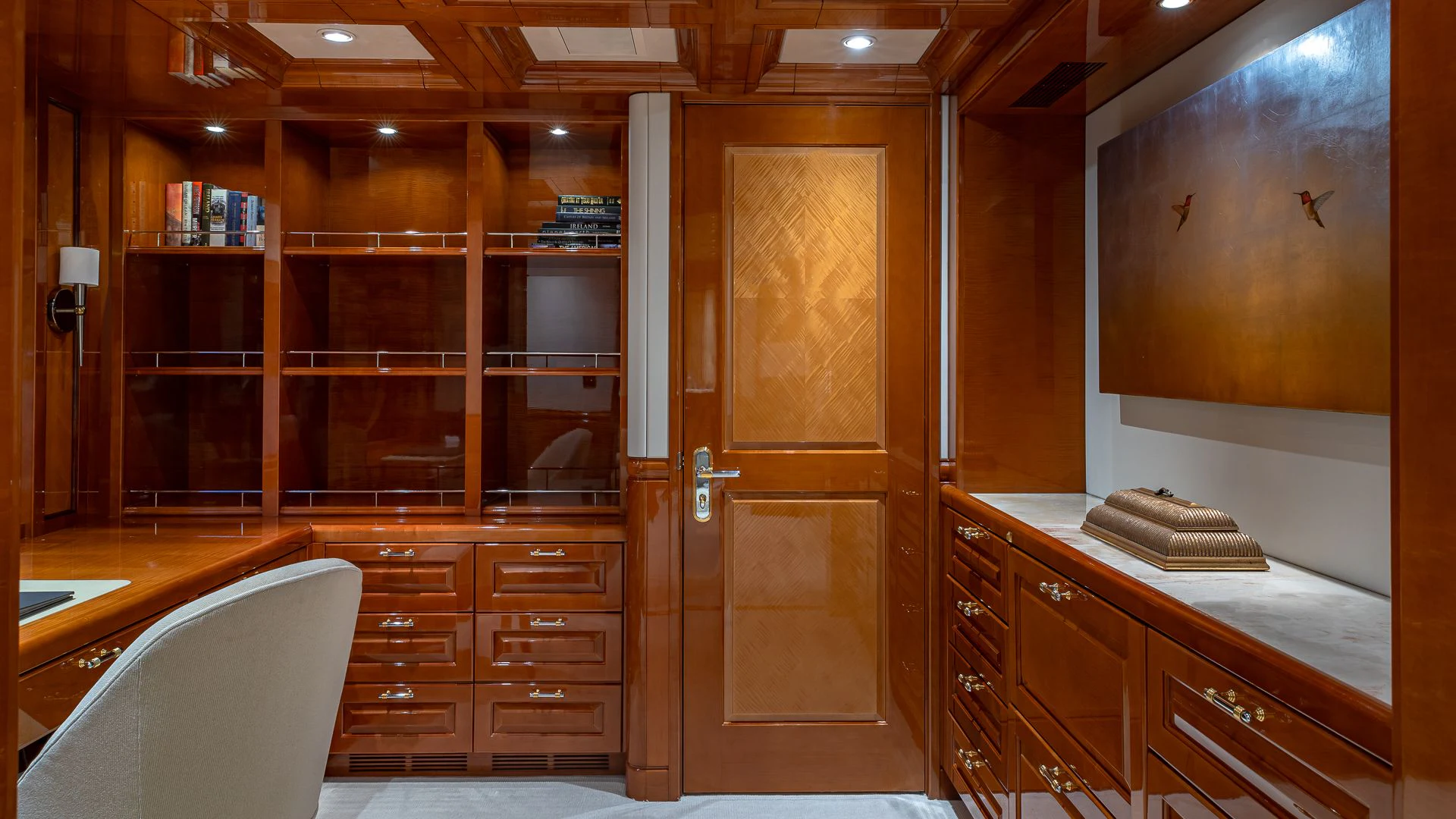 a room with wooden cabinets aboard MILESTONE Yacht for Sale