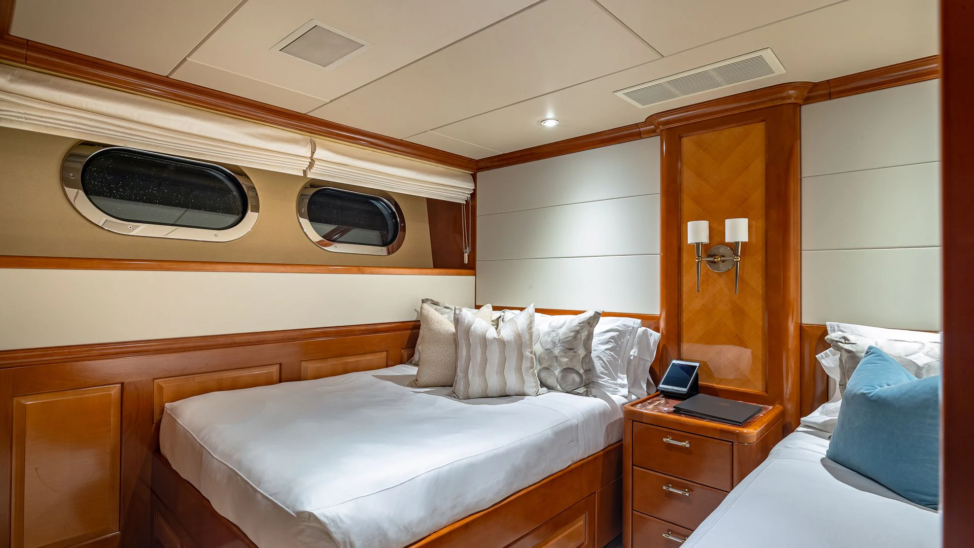 a room with two beds aboard MILESTONE Yacht for Sale
