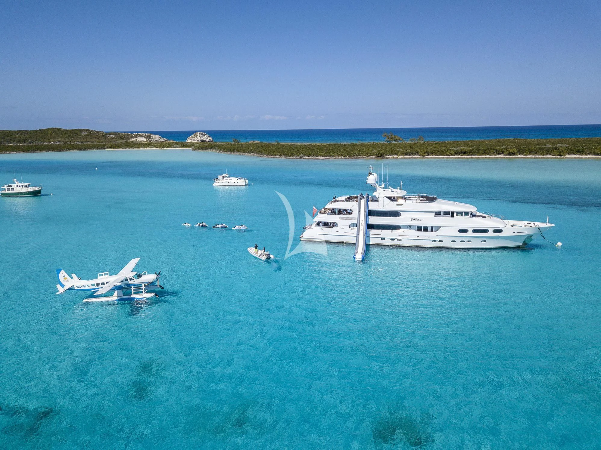a group of boats in the water aboard MILESTONE Yacht for Sale