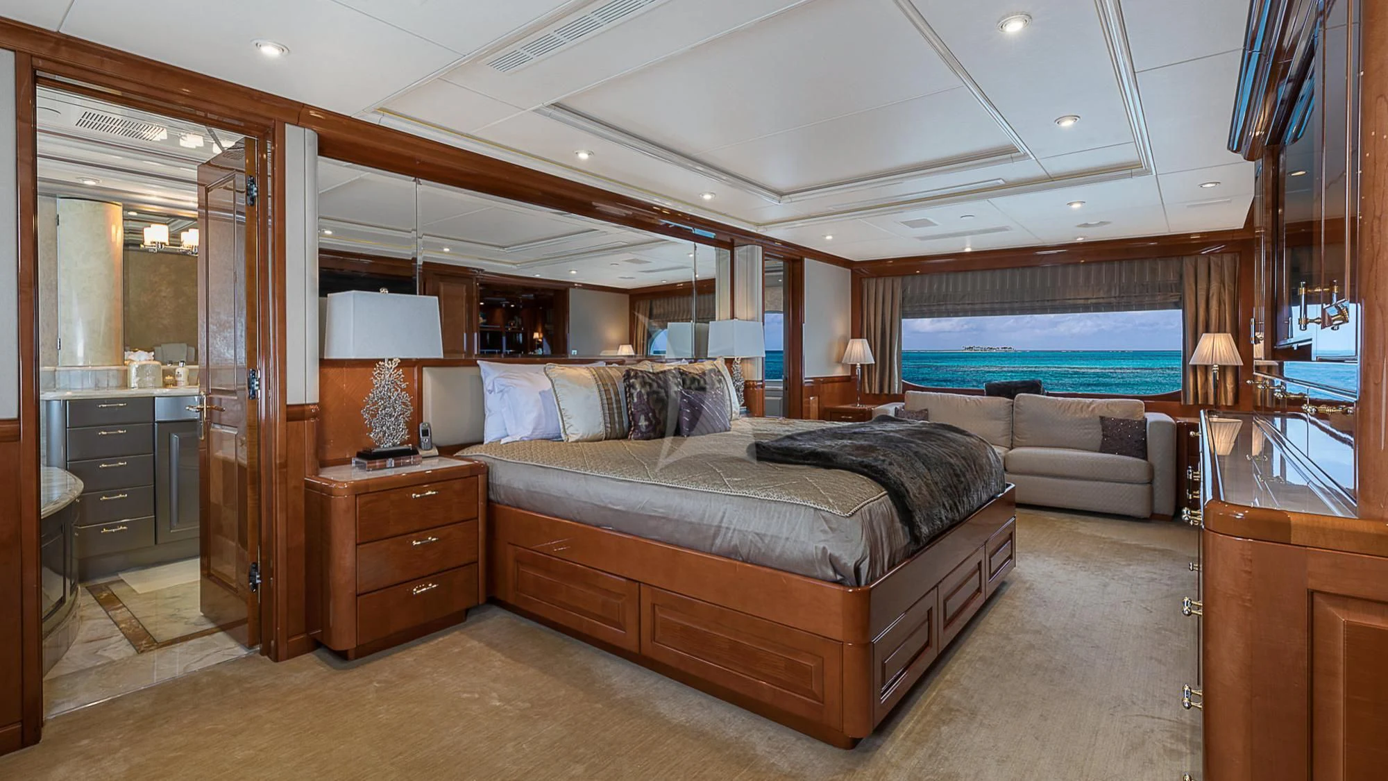 a large bedroom with a bed aboard MILESTONE Yacht for Sale