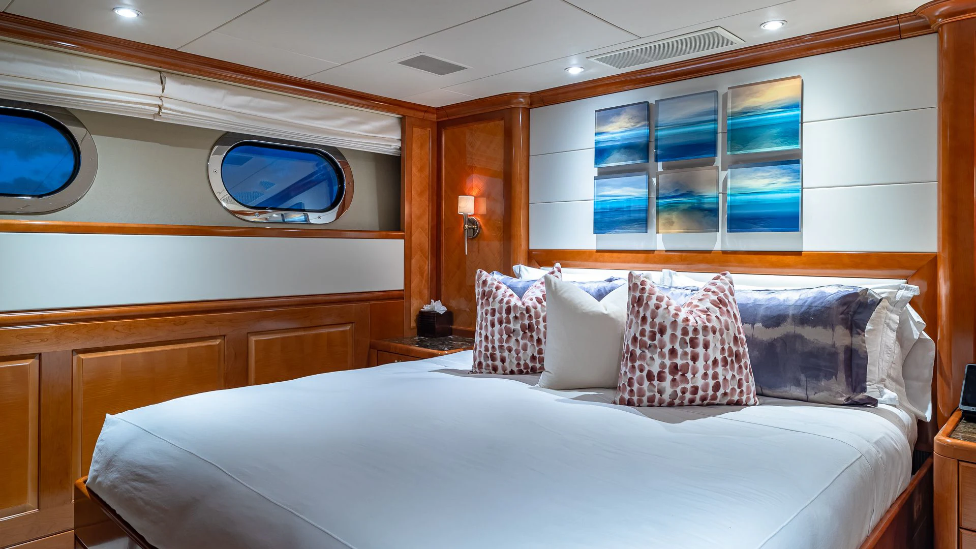 a bed with pillows aboard MILESTONE Yacht for Sale