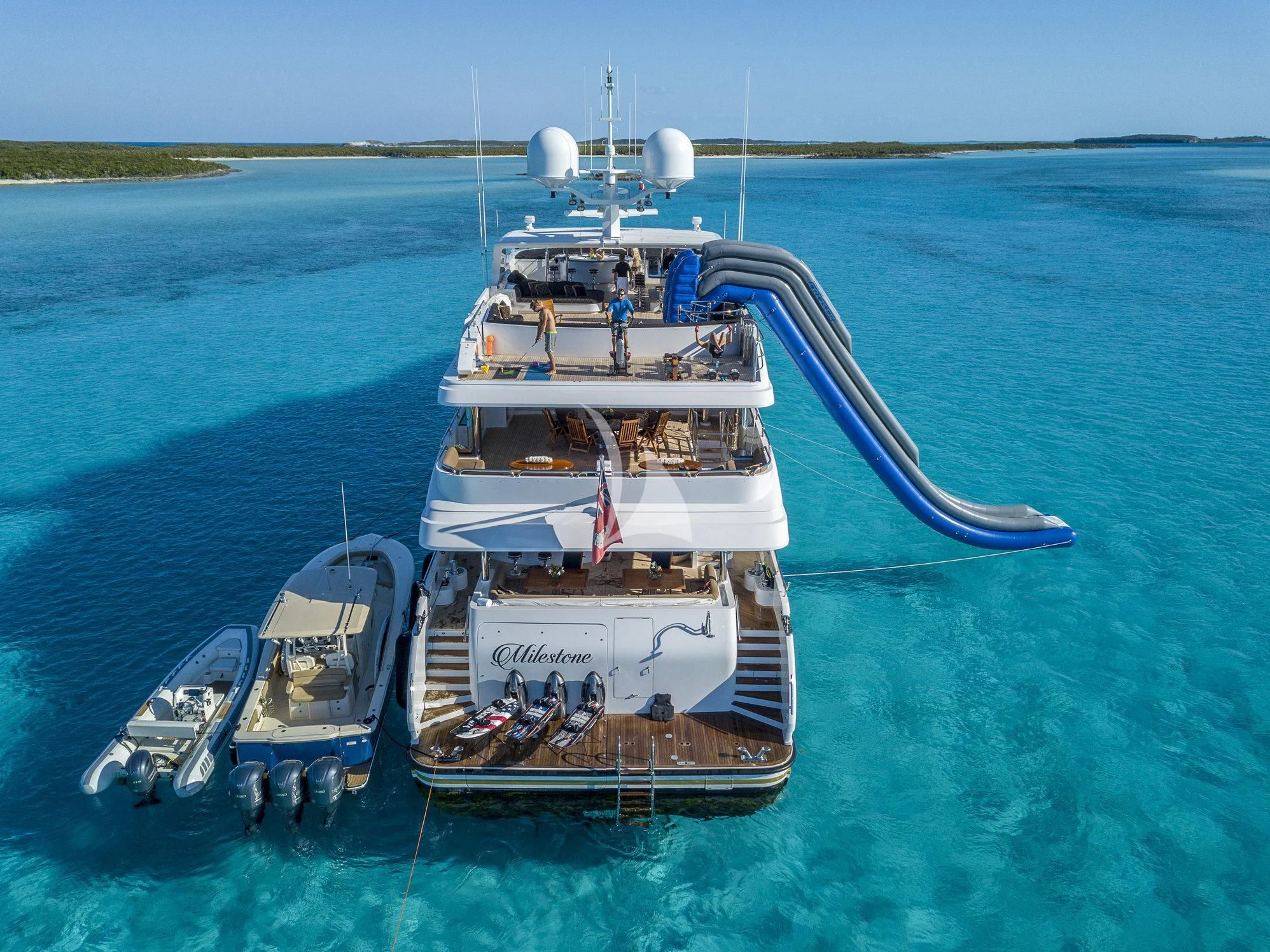 a boat with a motor attached to it in the water aboard MILESTONE Yacht for Sale