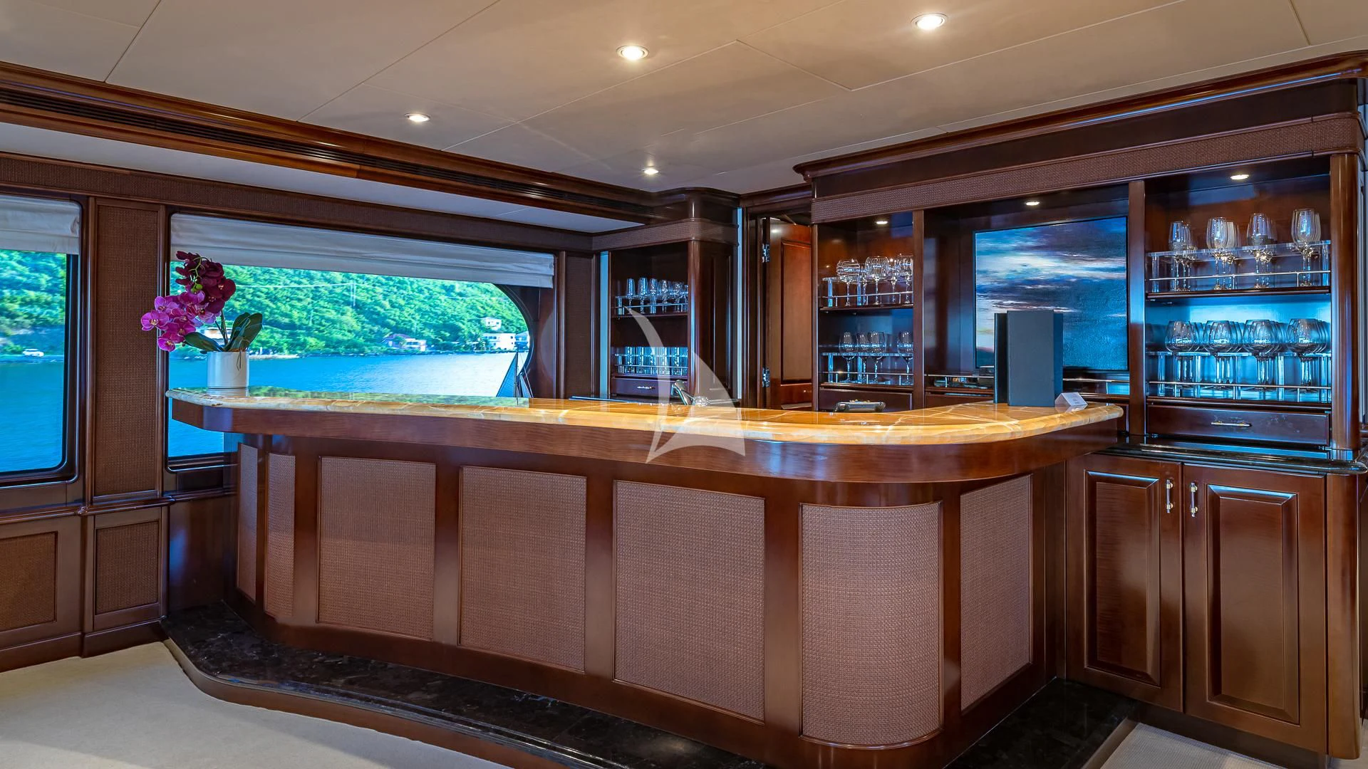 a kitchen with a large bar aboard MILESTONE Yacht for Sale