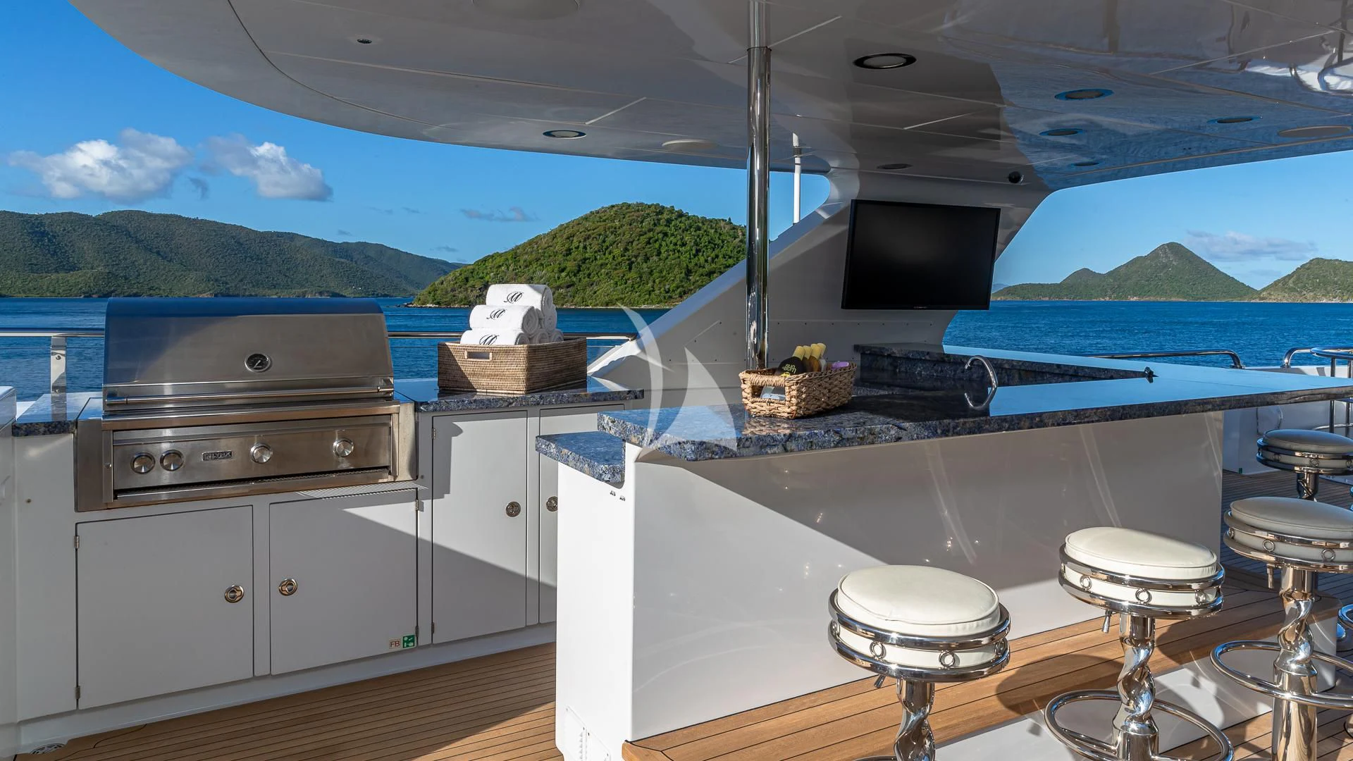 a kitchen with a large window overlooking the ocean aboard MILESTONE Yacht for Sale