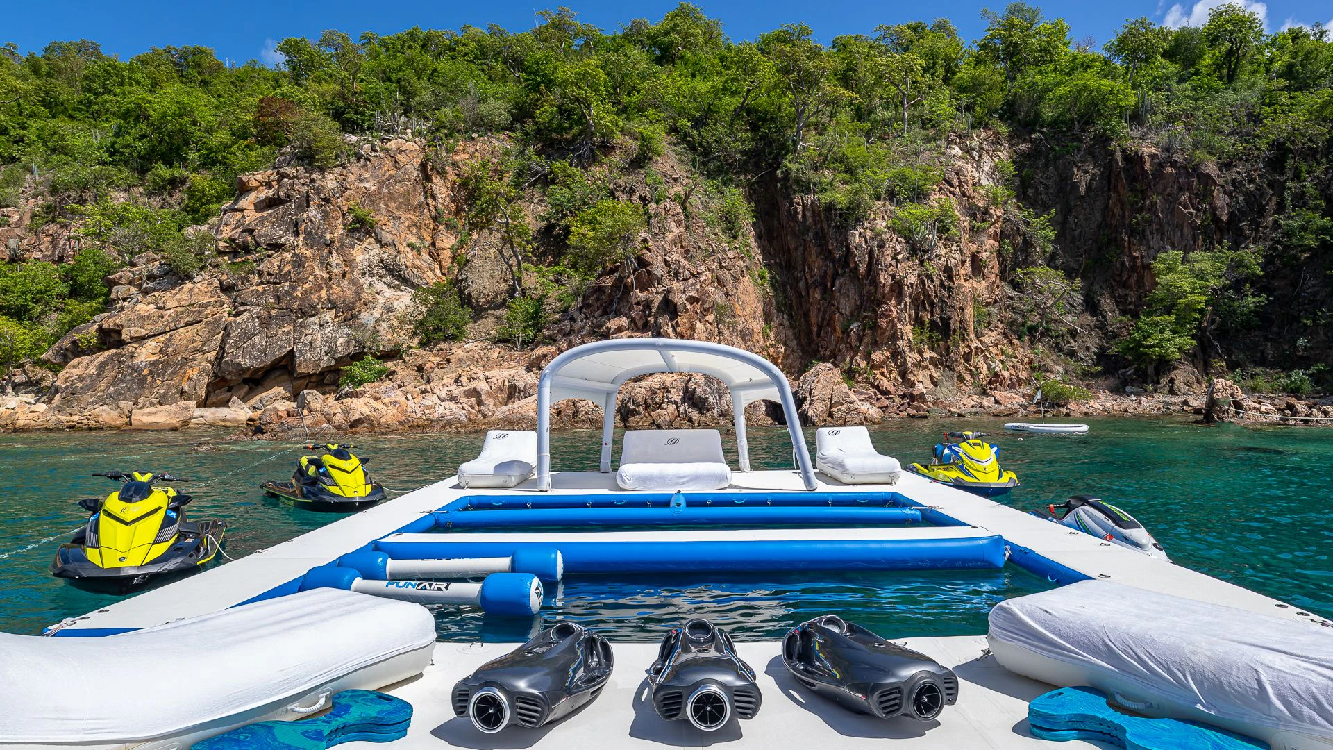 a group of boats on a body of water aboard MILESTONE Yacht for Sale
