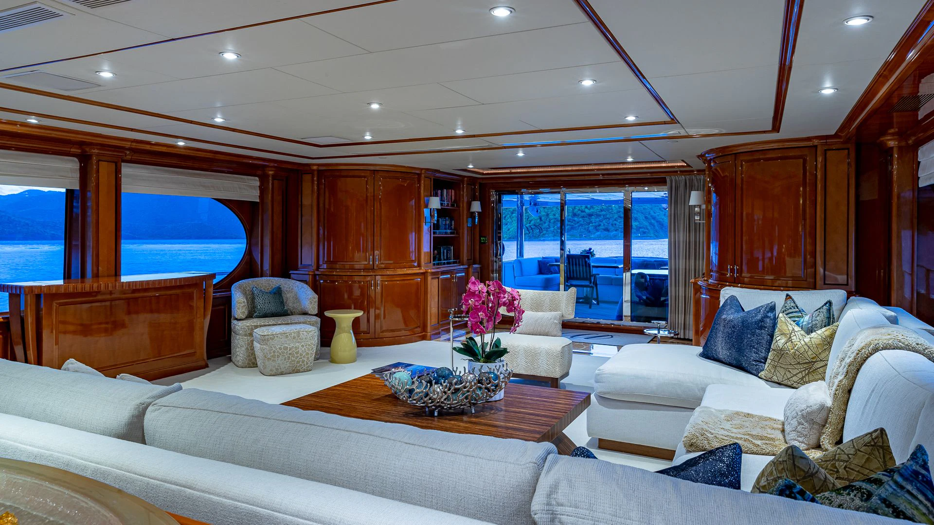 a living room with a large window aboard MILESTONE Yacht for Sale