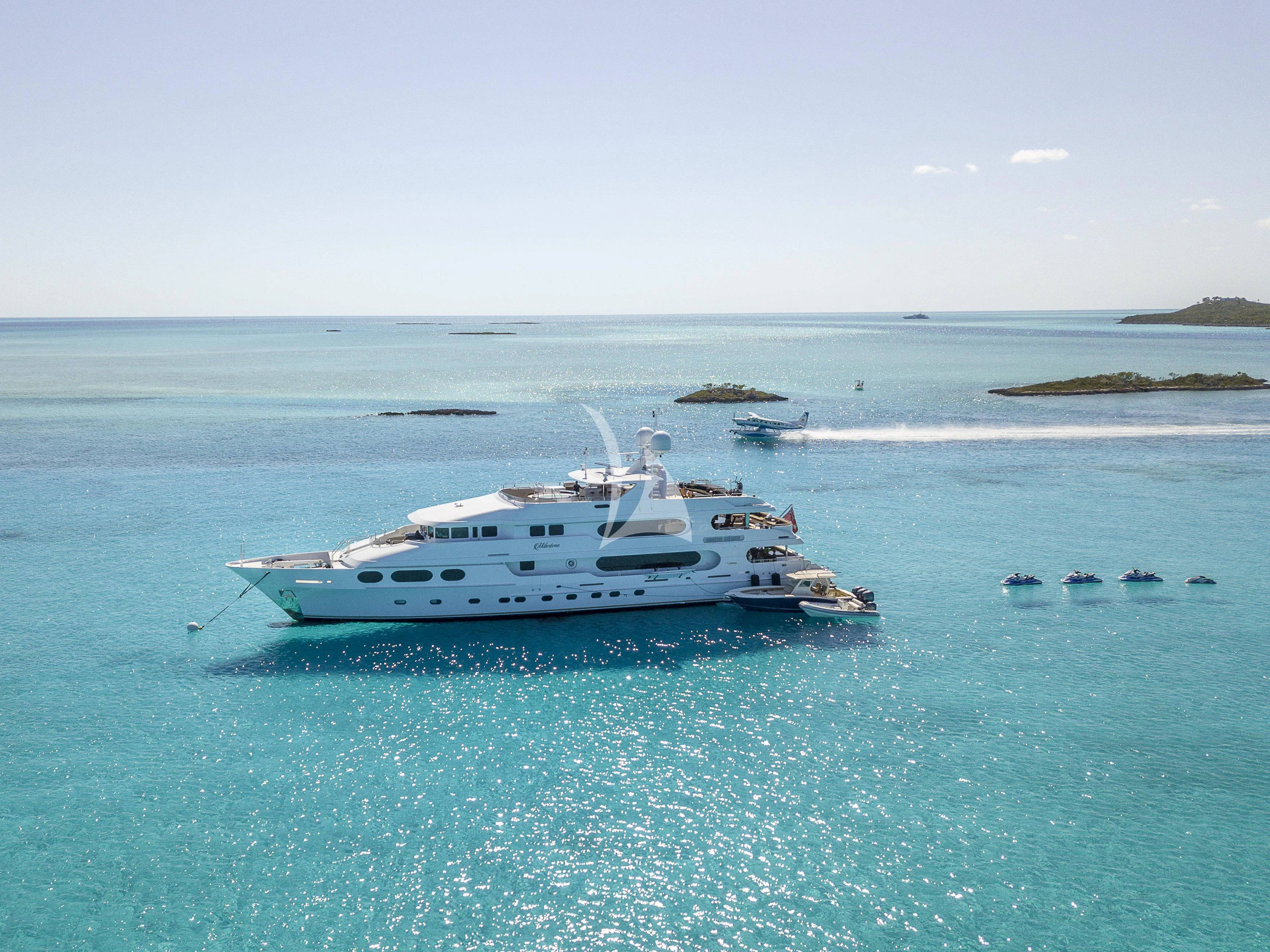 a white yacht in the water aboard MILESTONE Yacht for Sale