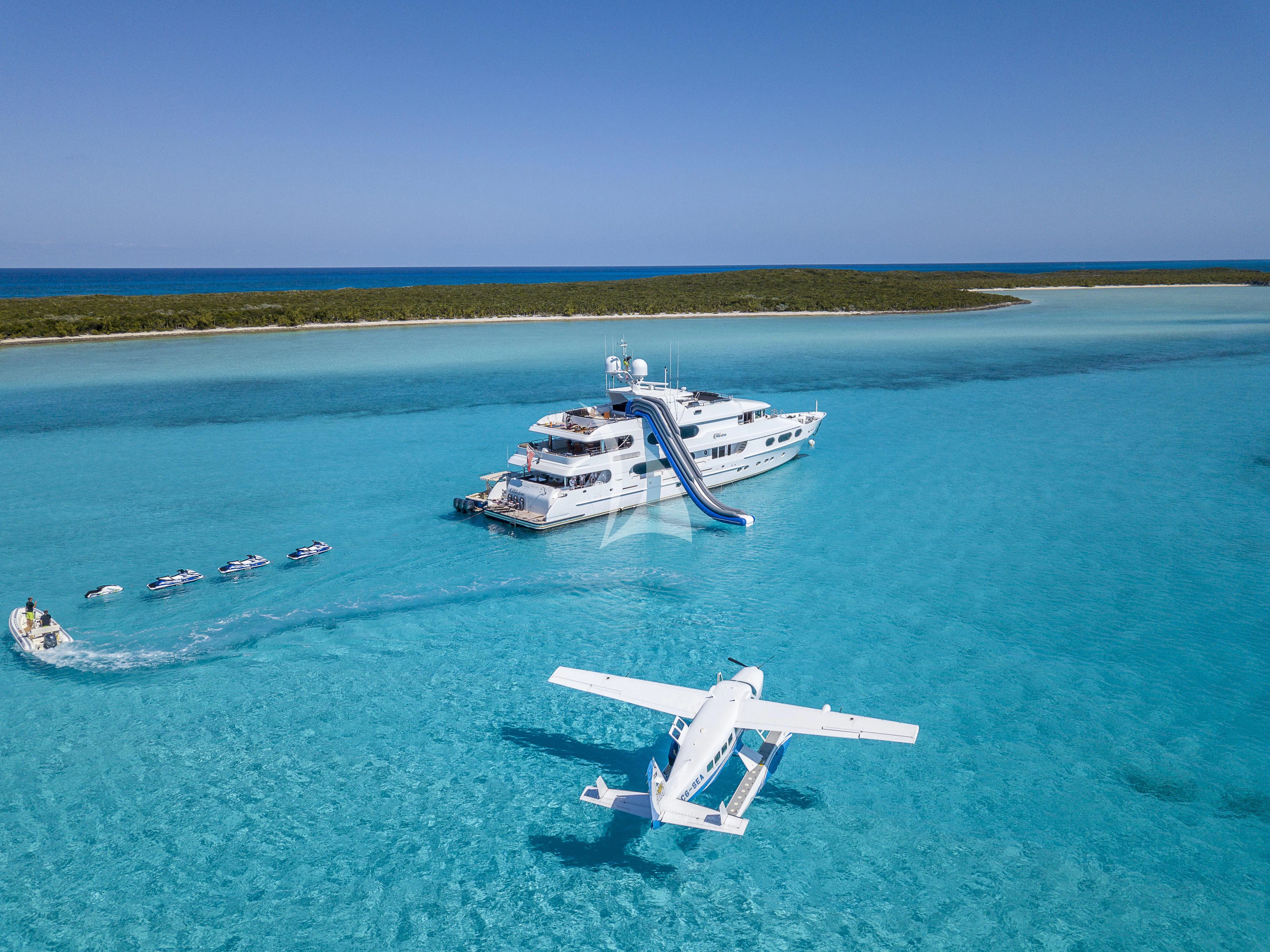 a plane and a plane in the water aboard MILESTONE Yacht for Sale