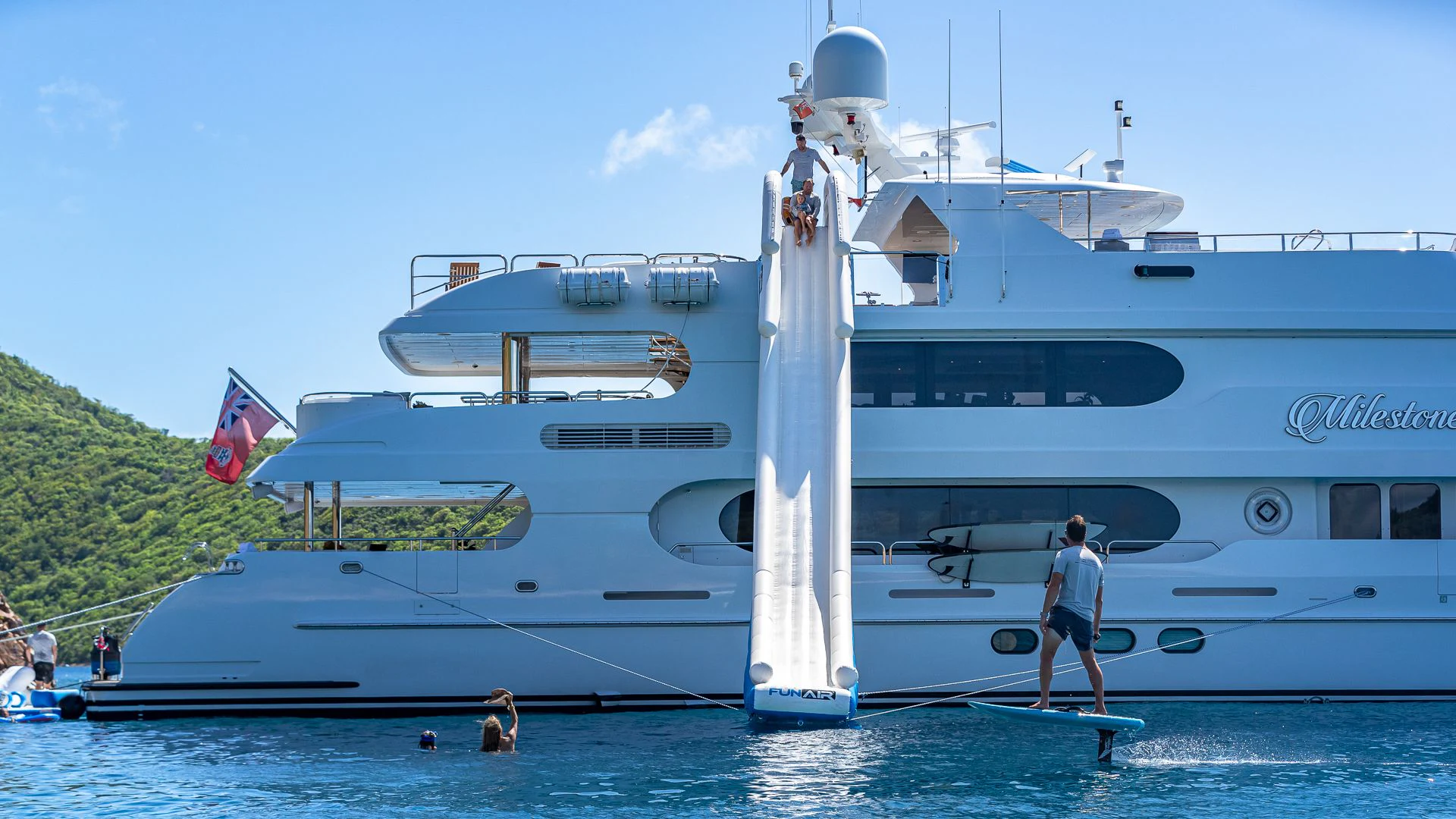 a large boat in the water aboard MILESTONE Yacht for Sale