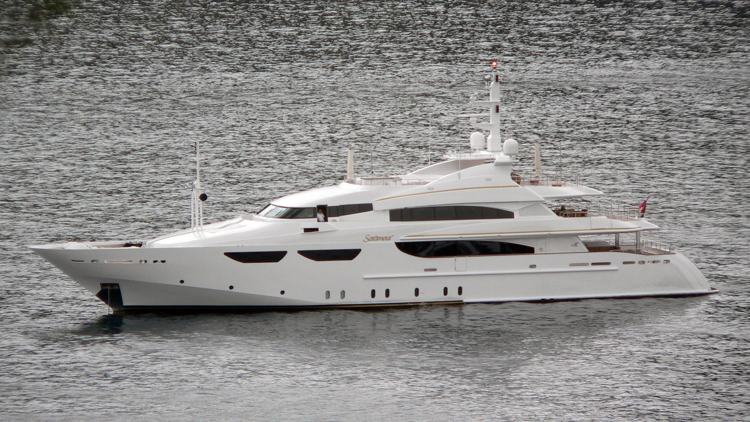 a white yacht in the water aboard ALASKA Yacht for Sale