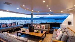 a living room with a large swimming pool aboard ALASKA Yacht for Sale