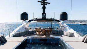 a large ship with a large black object on it aboard ALASKA Yacht for Sale