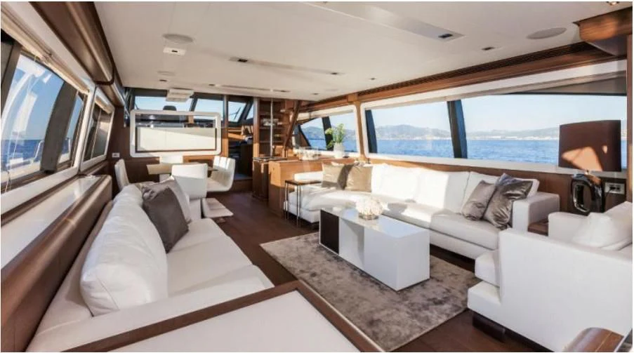 a living room with a large window aboard HEAL Yacht for Sale