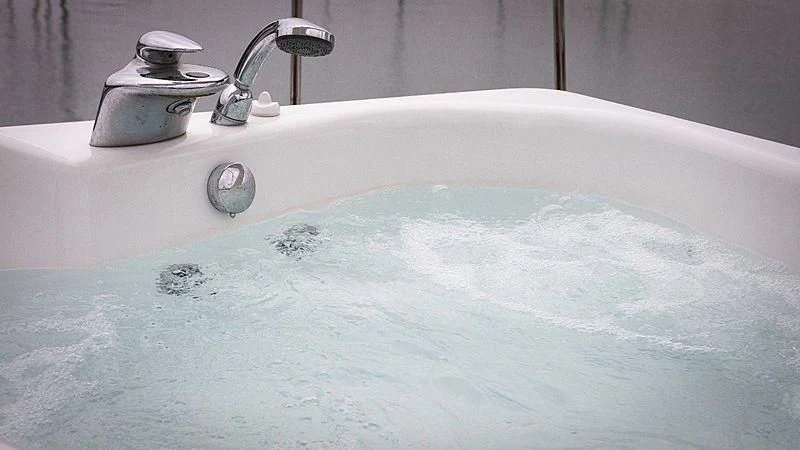 a bathtub with a faucet aboard ALDA 2 Yacht for Sale