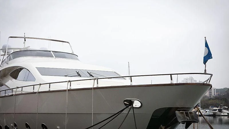a white yacht docked aboard ALDA 2 Yacht for Sale