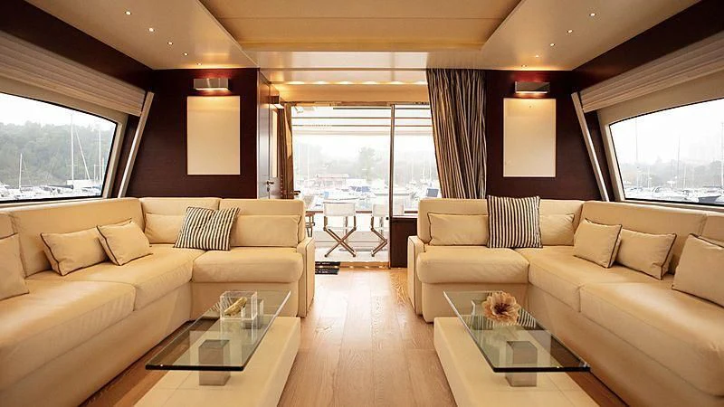 a living room with a couch and a coffee table aboard ALDA 2 Yacht for Sale