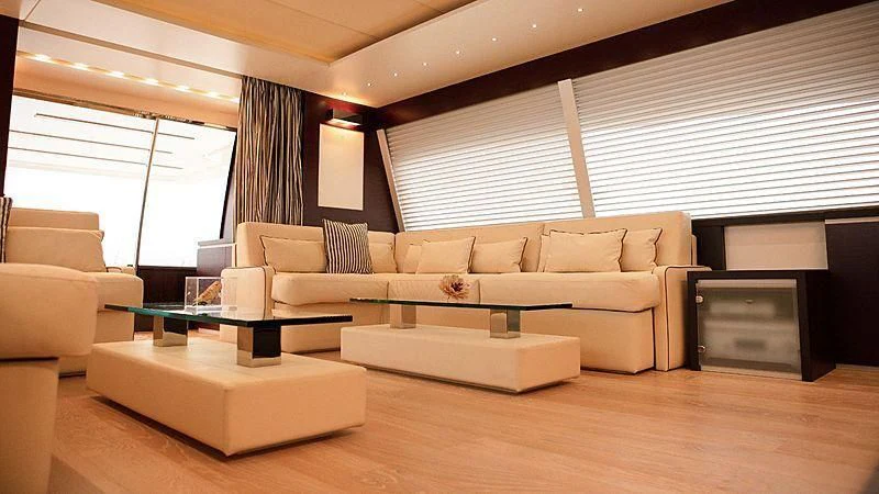 a living room with a couch and a fireplace aboard ALDA 2 Yacht for Sale