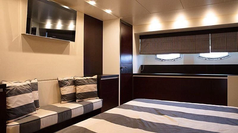 a room with a bed and a couch aboard ALDA 2 Yacht for Sale