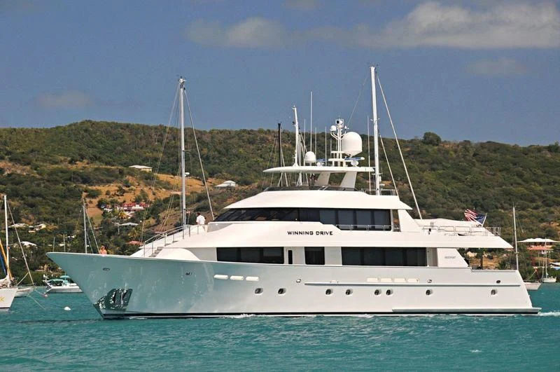 a white boat in the water aboard EXCELLENCE Yacht for Sale