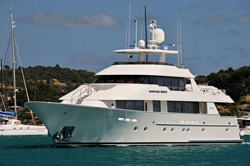 a white yacht in the water aboard EXCELLENCE Yacht for Sale
