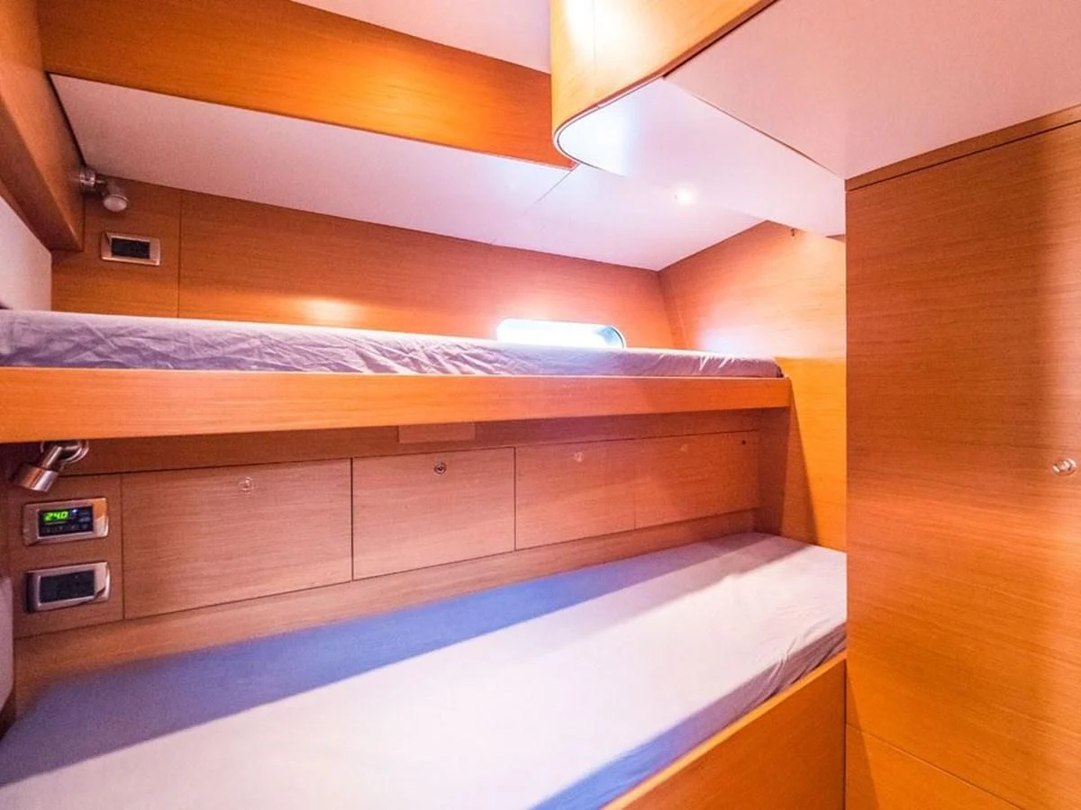 a room with a large wooden cabinet aboard KALINDA Yacht for Sale