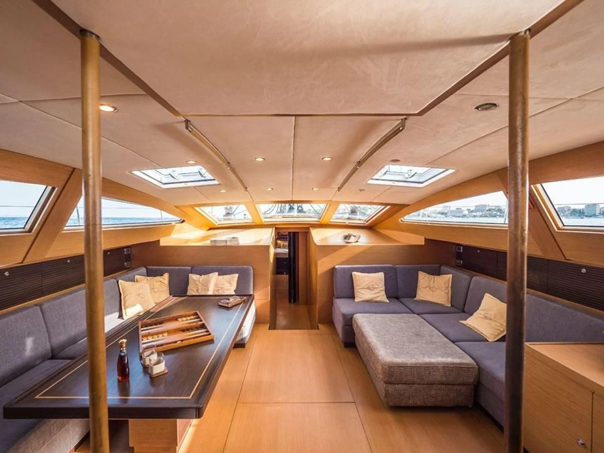 a room with a couch and a table aboard KALINDA Yacht for Sale