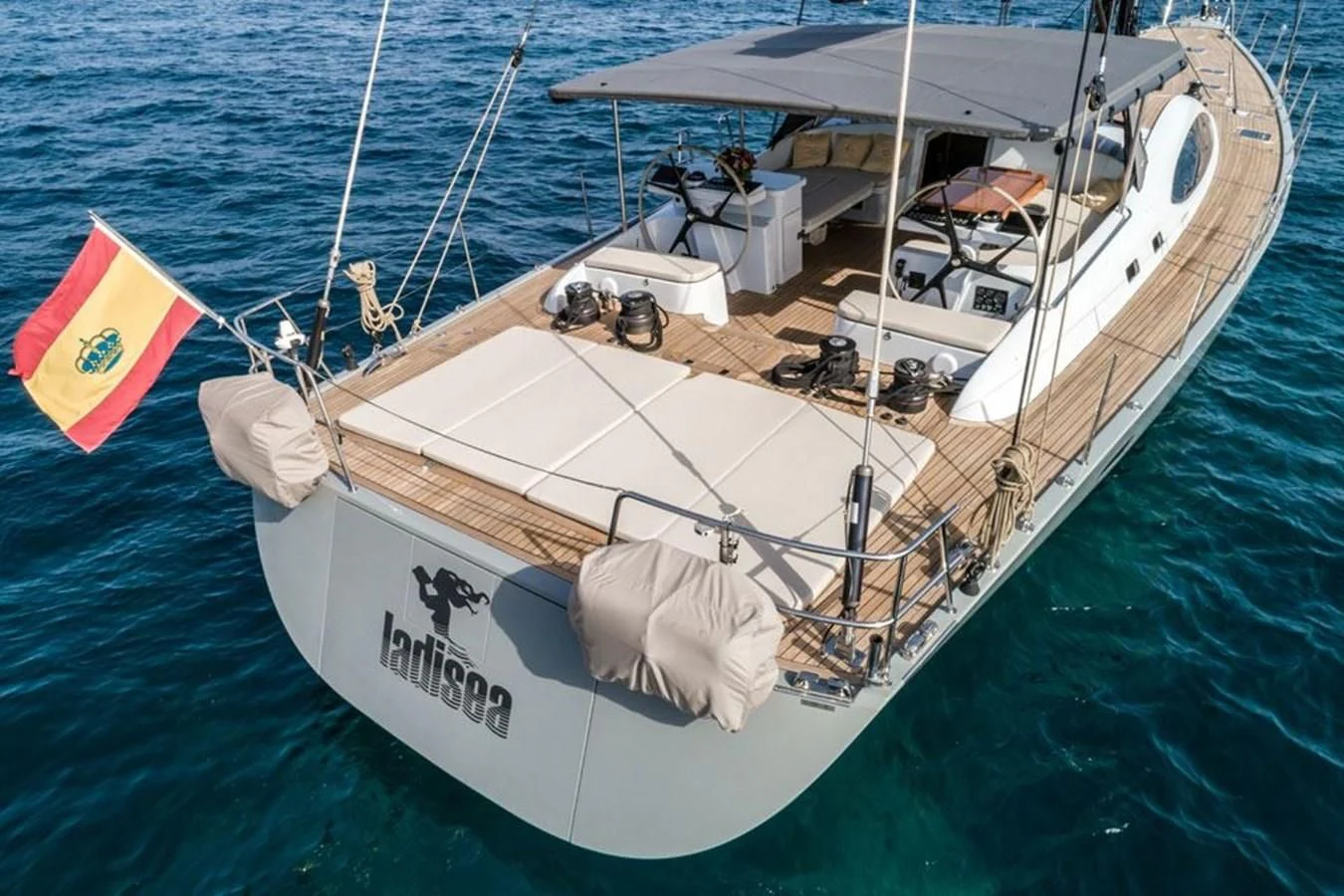 a white boat on the water aboard KALINDA Yacht for Sale