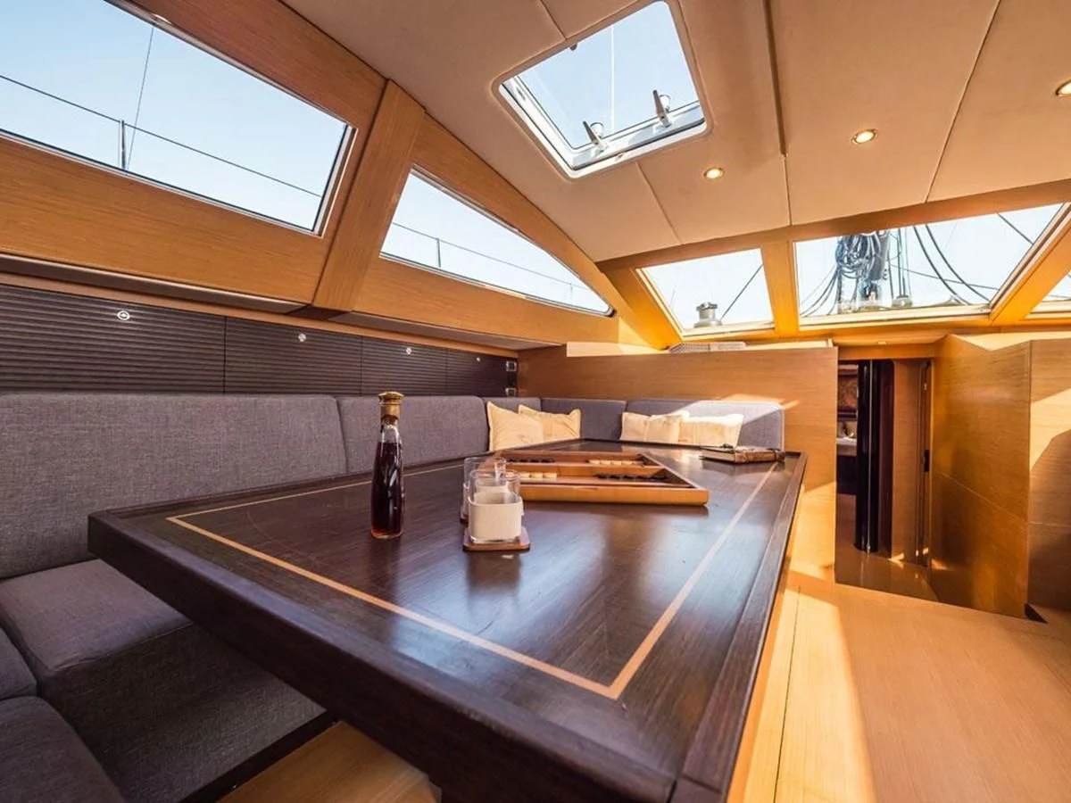 a room with a table and chairs aboard KALINDA Yacht for Sale