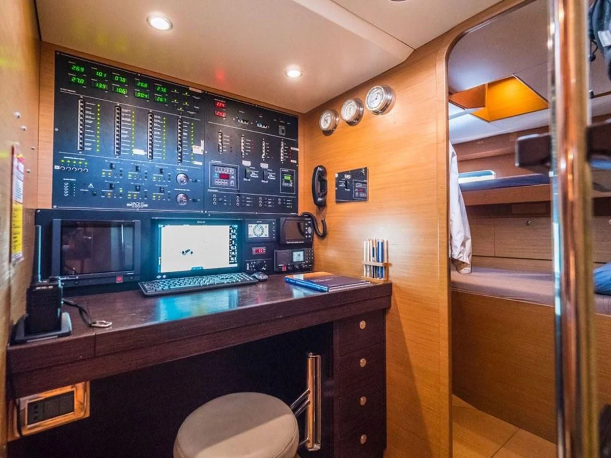 a computer on a desk aboard KALINDA Yacht for Sale