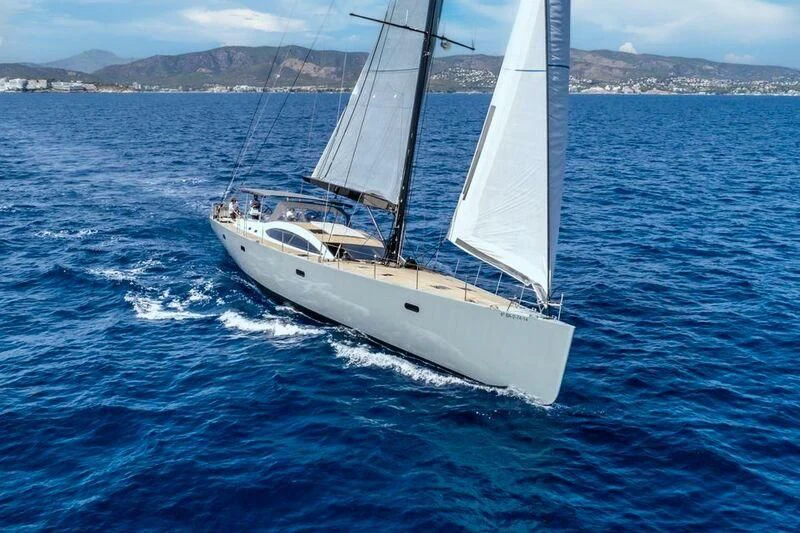 a white boat on the water aboard KALINDA Yacht for Sale
