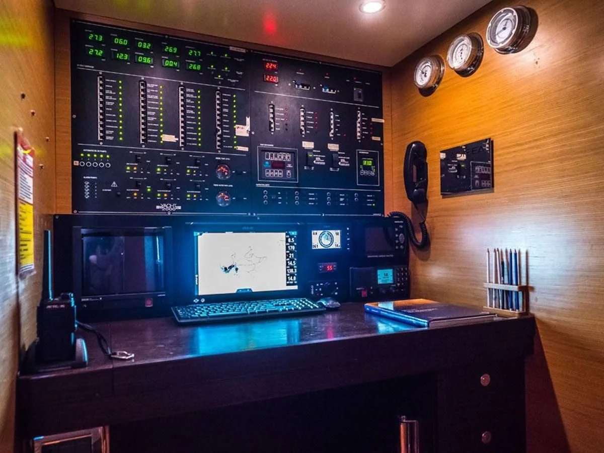 a computer with a keyboard and a monitor aboard KALINDA Yacht for Sale