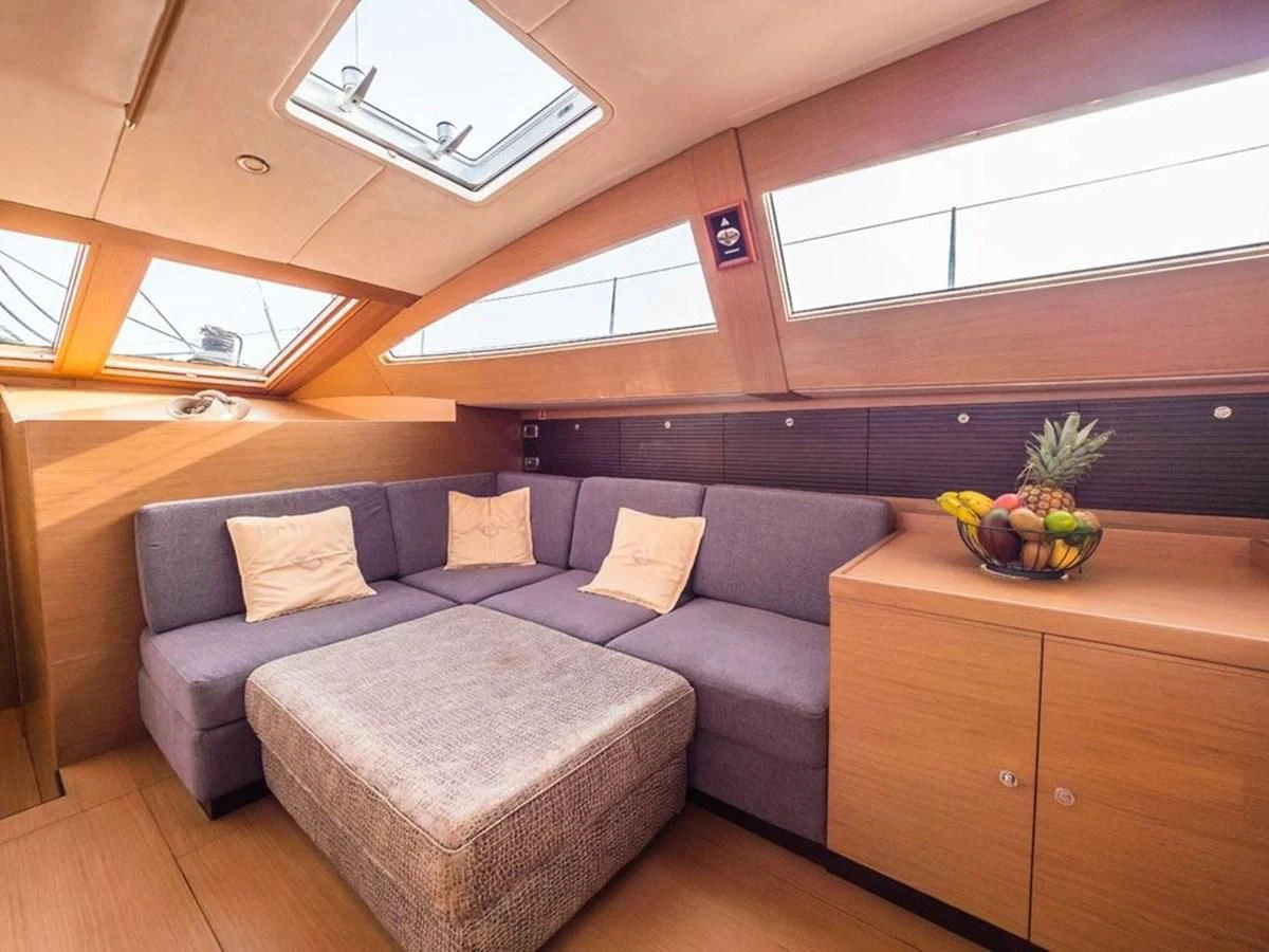 a couch in a room aboard KALINDA Yacht for Sale