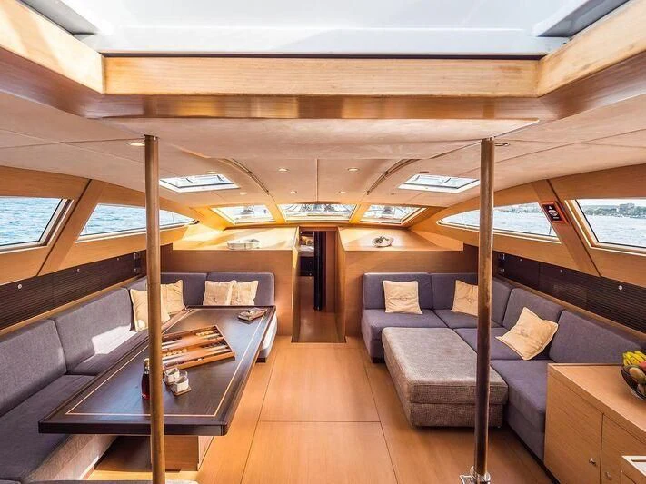 a room with a couch and a table aboard KALINDA Yacht for Sale