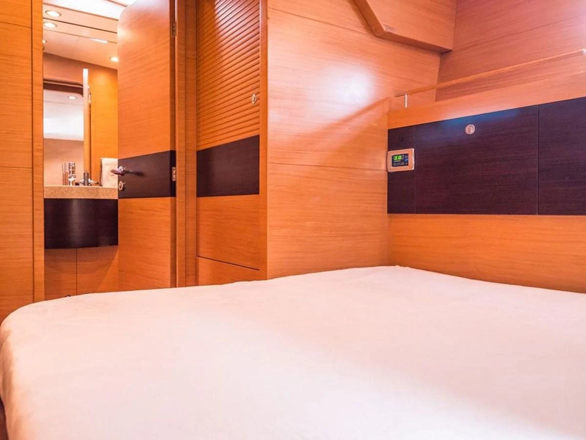 a bed in a room aboard KALINDA Yacht for Sale