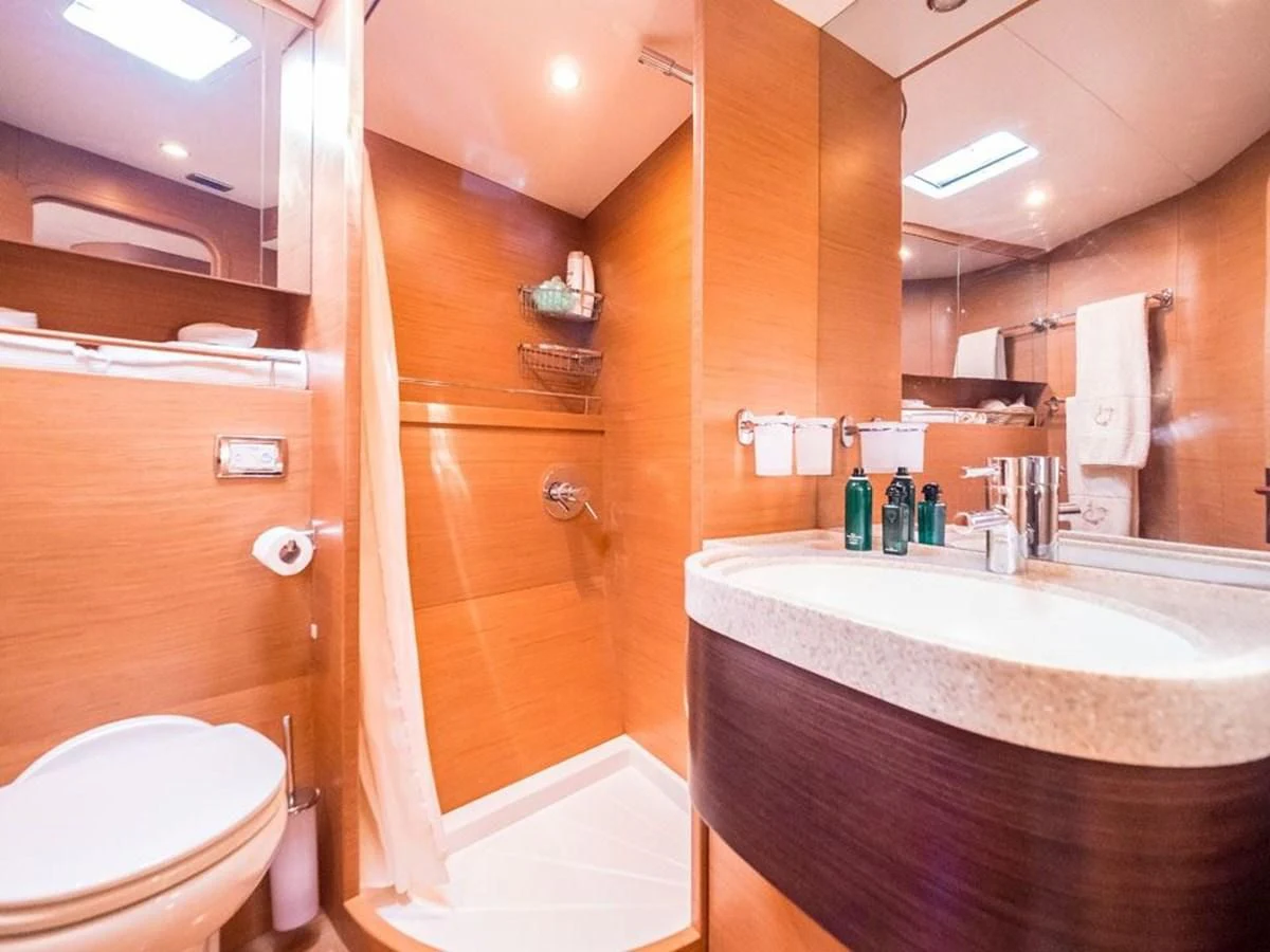 a bathroom with a shower and sink aboard KALINDA Yacht for Sale