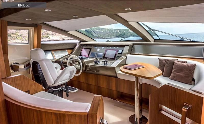 a car with a table and chairs aboard RUFF ONE II Yacht for Sale