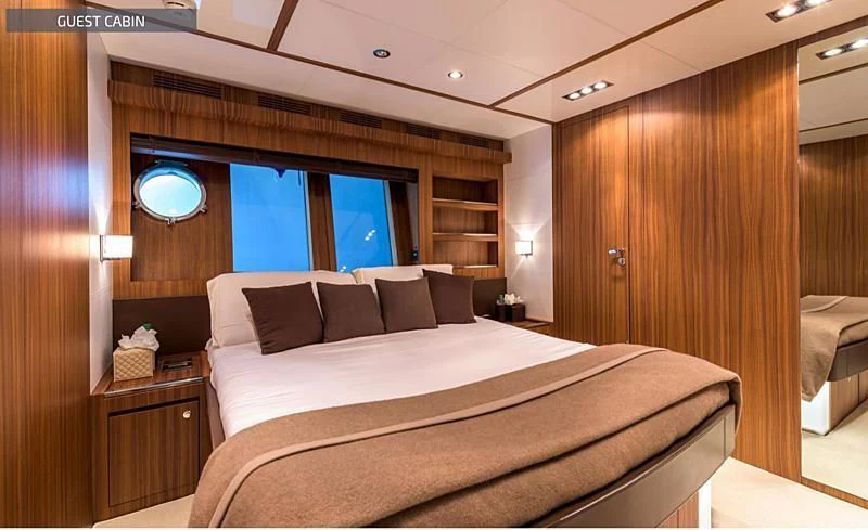 a bed in a room aboard RUFF ONE II Yacht for Sale