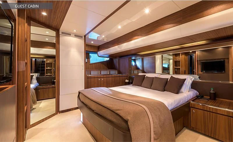a bed in a room aboard RUFF ONE II Yacht for Sale