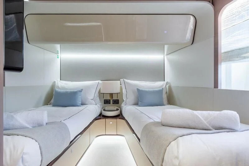a room with two beds aboard AZIMUT GRANDE 27/52 Yacht for Sale