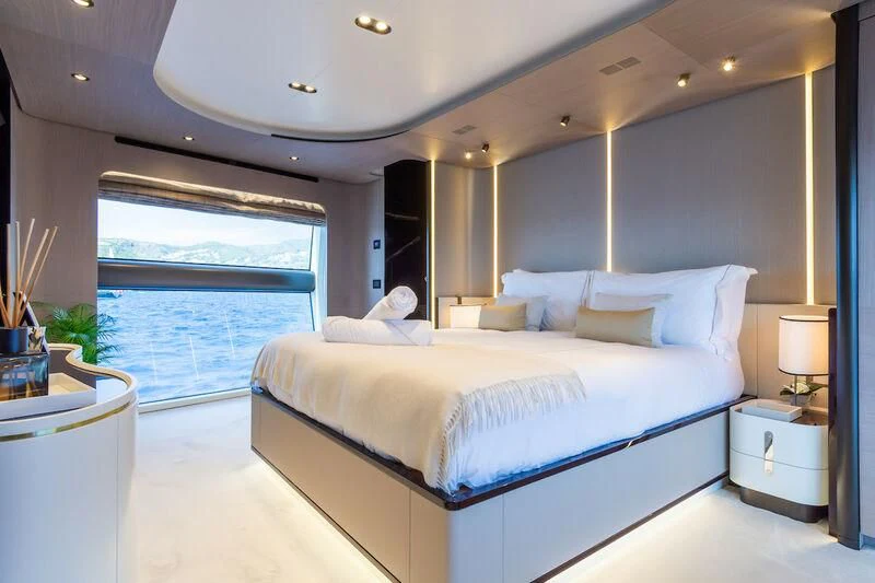 a large bedroom with a large bed aboard AZIMUT GRANDE 27/52 Yacht for Sale